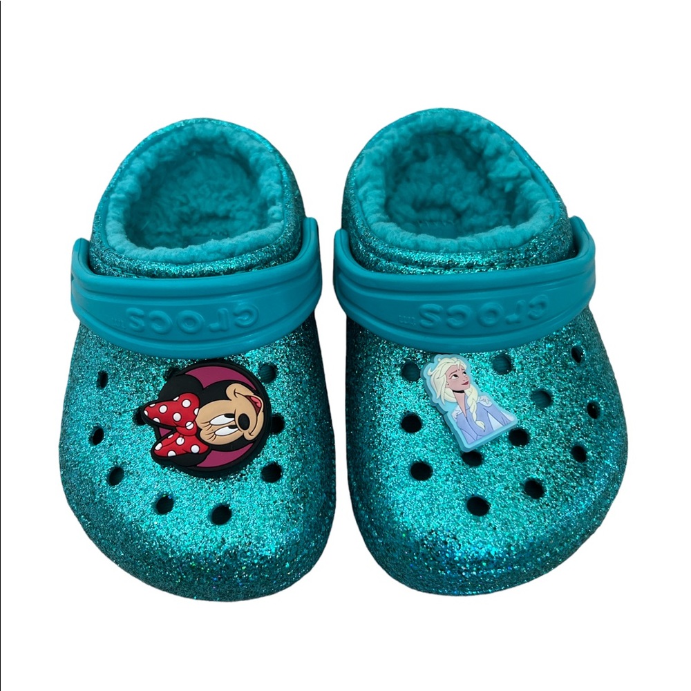 Teal sparkly crocs with Minnie Mouse and Elsa
